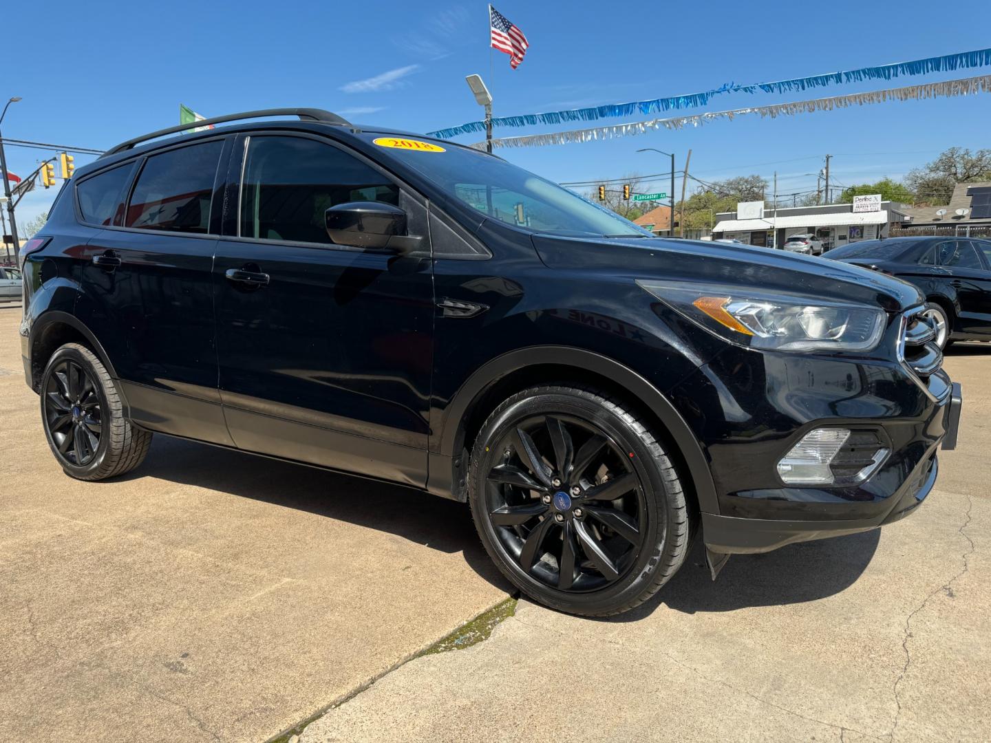 2018 BLACK FORD ESCAPE SE (1FMCU0GD4JU) , located at 5900 E. Lancaster Ave., Fort Worth, TX, 76112, (817) 457-5456, 0.000000, 0.000000 - Photo#2